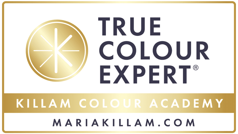 A gold and white logo for the true colour expert